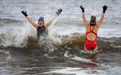 Wild swimmers and surfers call for year-round water quality testing of UK rivers and seas