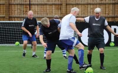Over 50s get stuck in to walking football at Market Road